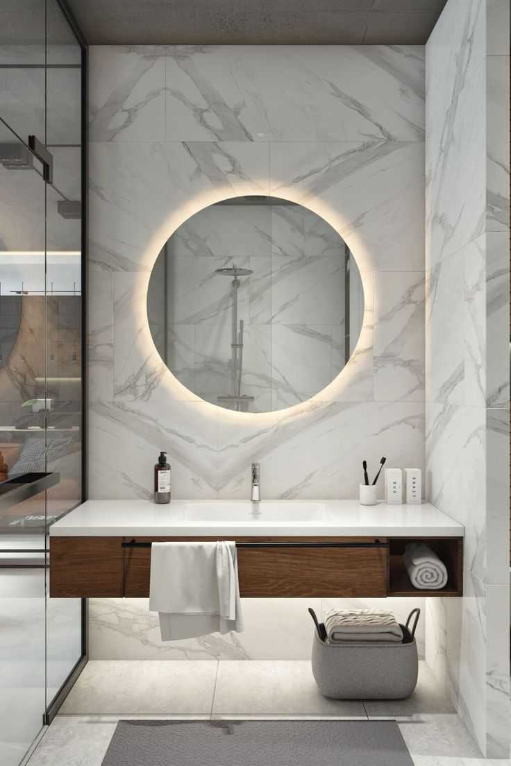 Kuvars görünümlü karo duvarlı banyo, yüzer makyaj tezgahı, LED ışıklı yuvarlak ayna